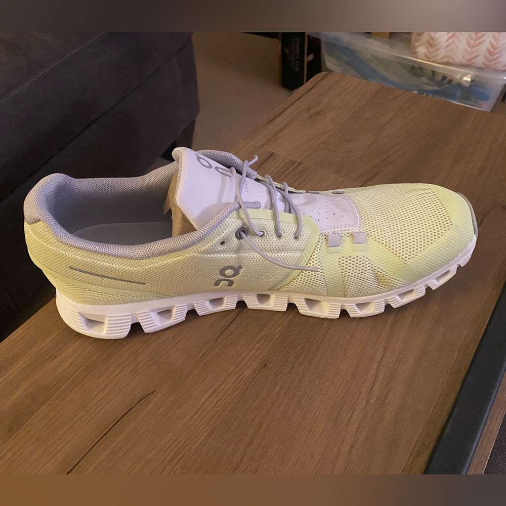 On Running Light Yellow and White Athletic Shoes